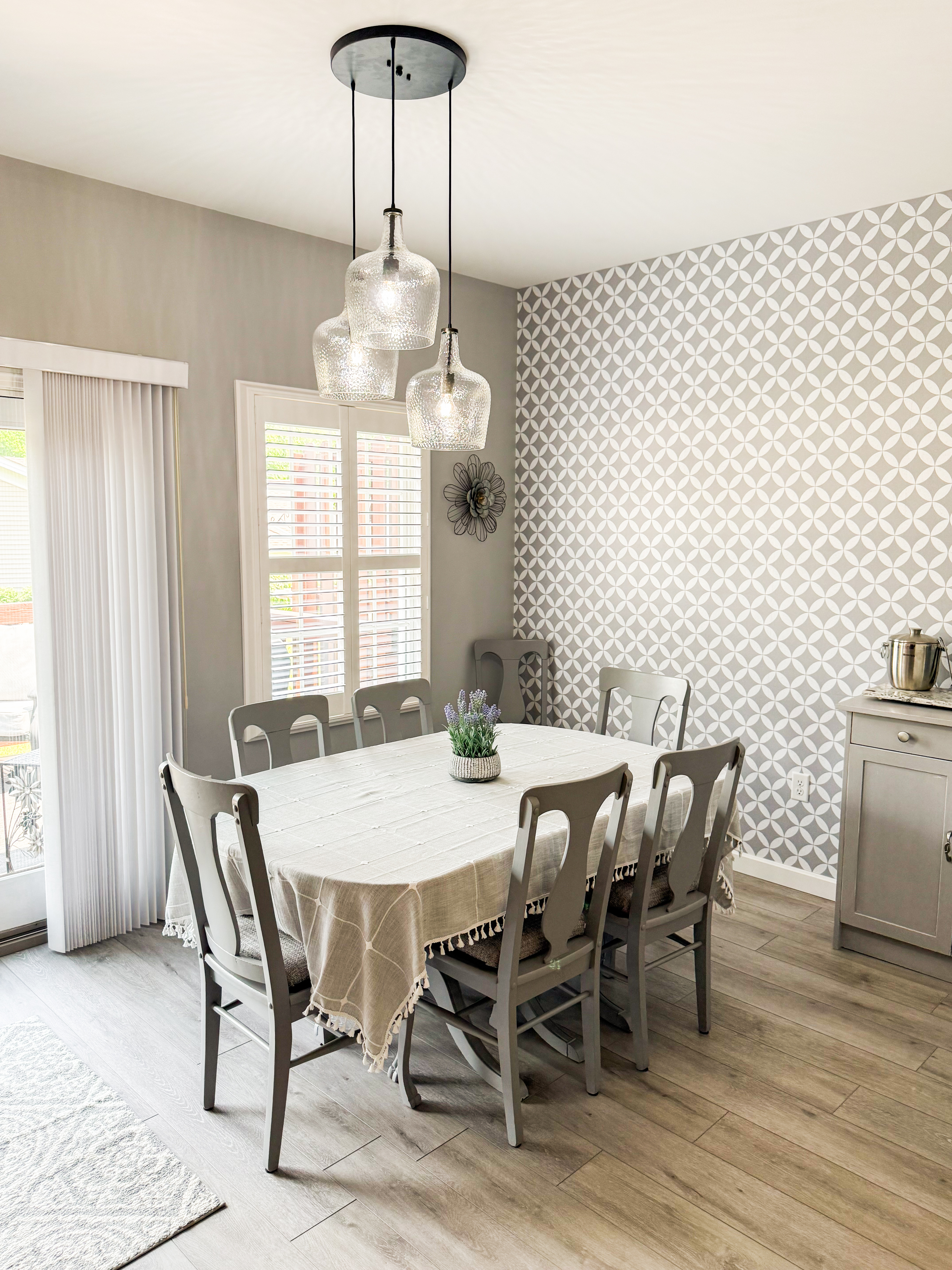 Dining room with feature wall, styled for a listing