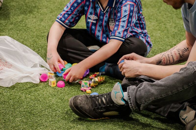 Hands-on team activity with colorful game pieces